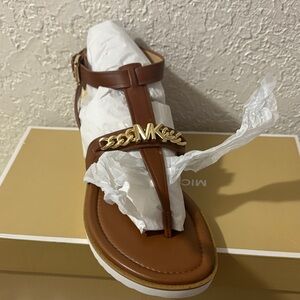 Michael Kors Tan Leather T-Strap Sandals with Gold MK Chain